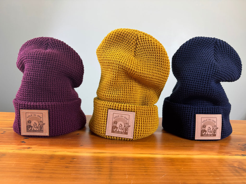 Keep your head warm on cold days with a Hole in One winter waffle knit beanie available in navy, gold & maroon