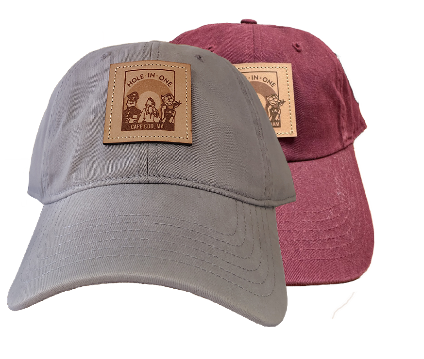 Our Hole in One baseball caps feature a classic curved brim and come in maroon and gray.